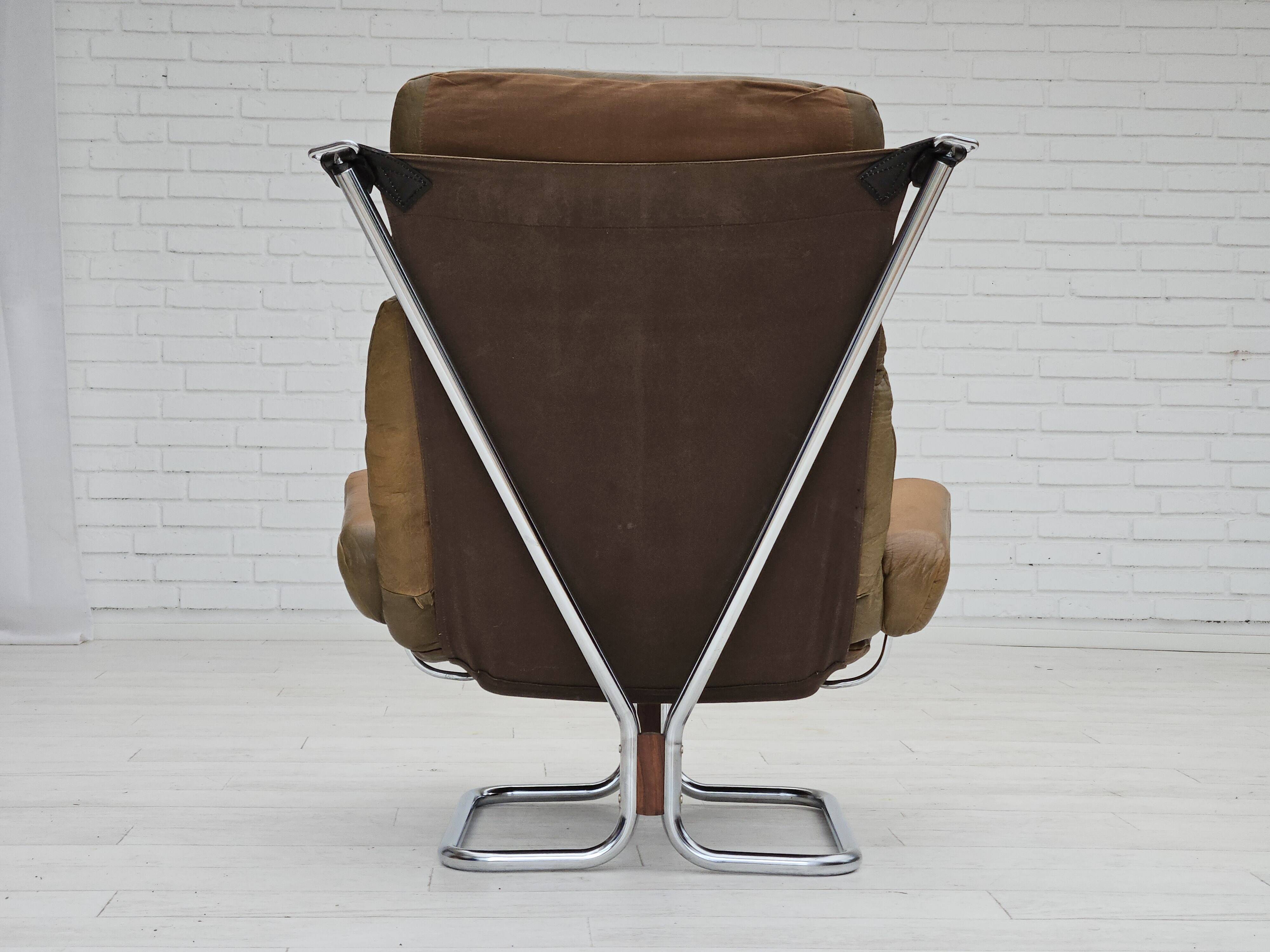 1970s, Norwegian design by Harald Relling, original condition, leather, chrome steel, teak wood.