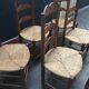Six old straw chairs