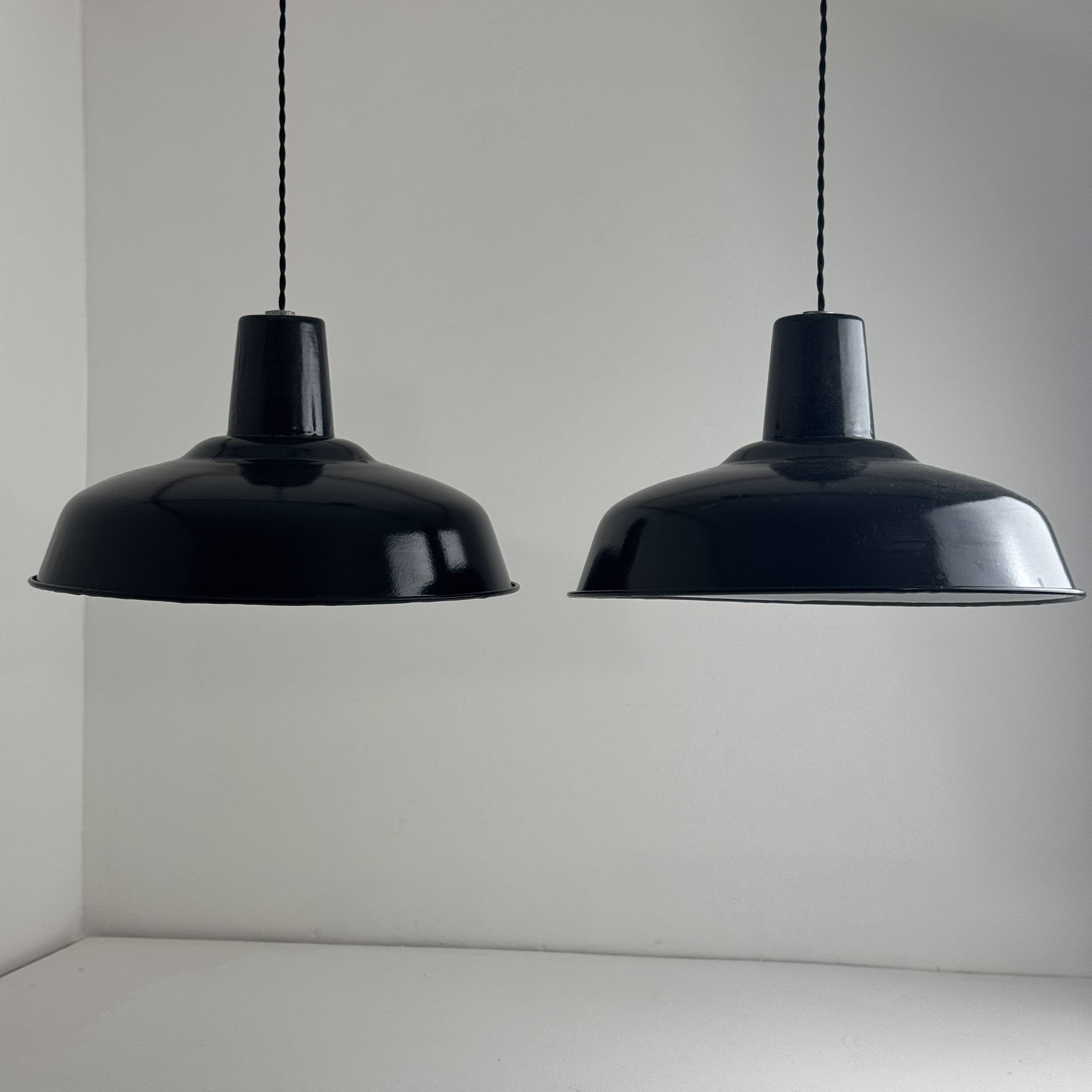 Pair of antique enamelled industrial workshop suspensions