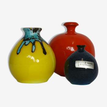 Three colorful vintage ampolla vases
