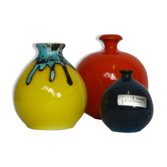 Three colorful vintage ampolla vases