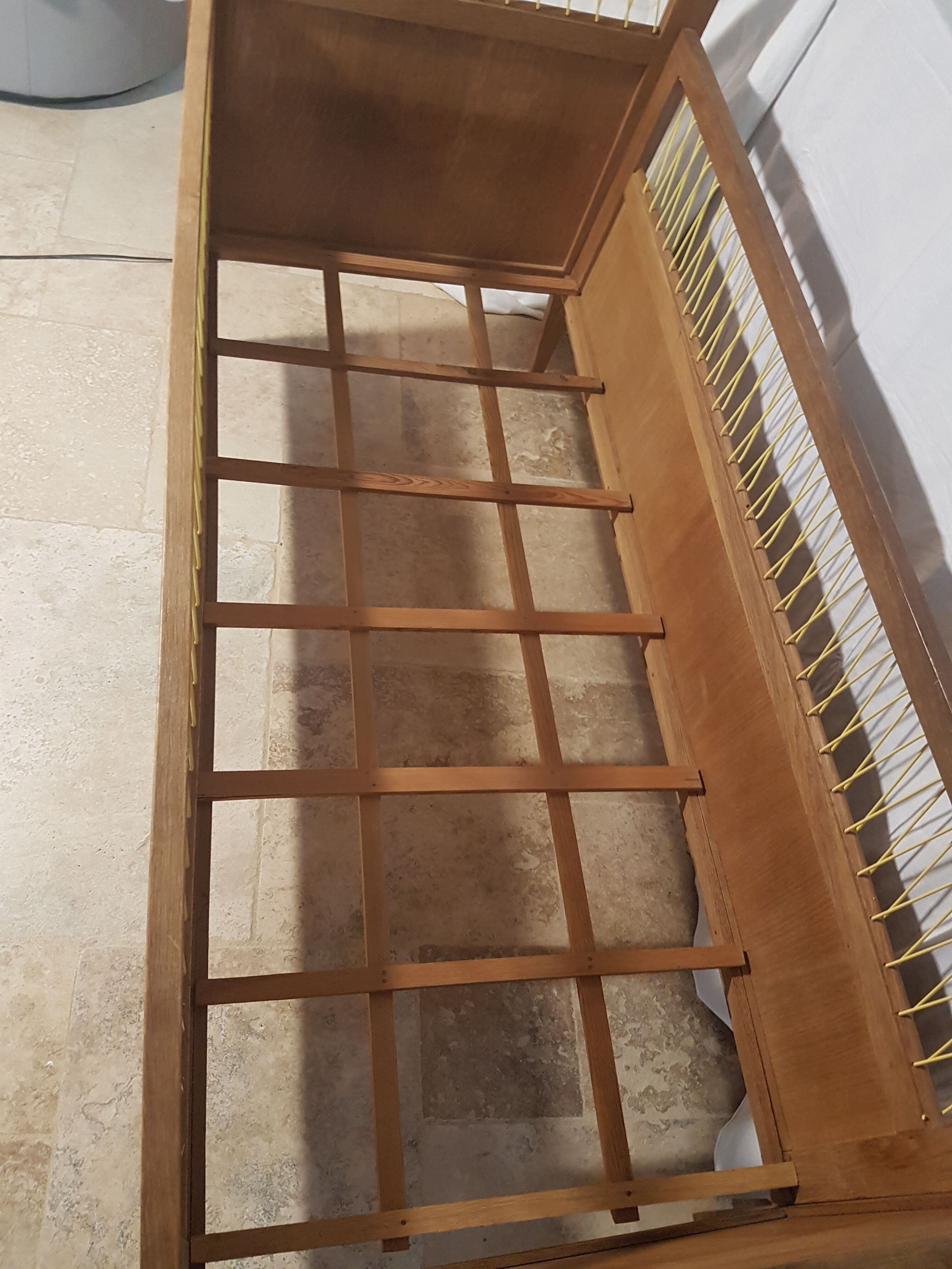 Children's bed made of wood and yellow scoubidou, 1950s.