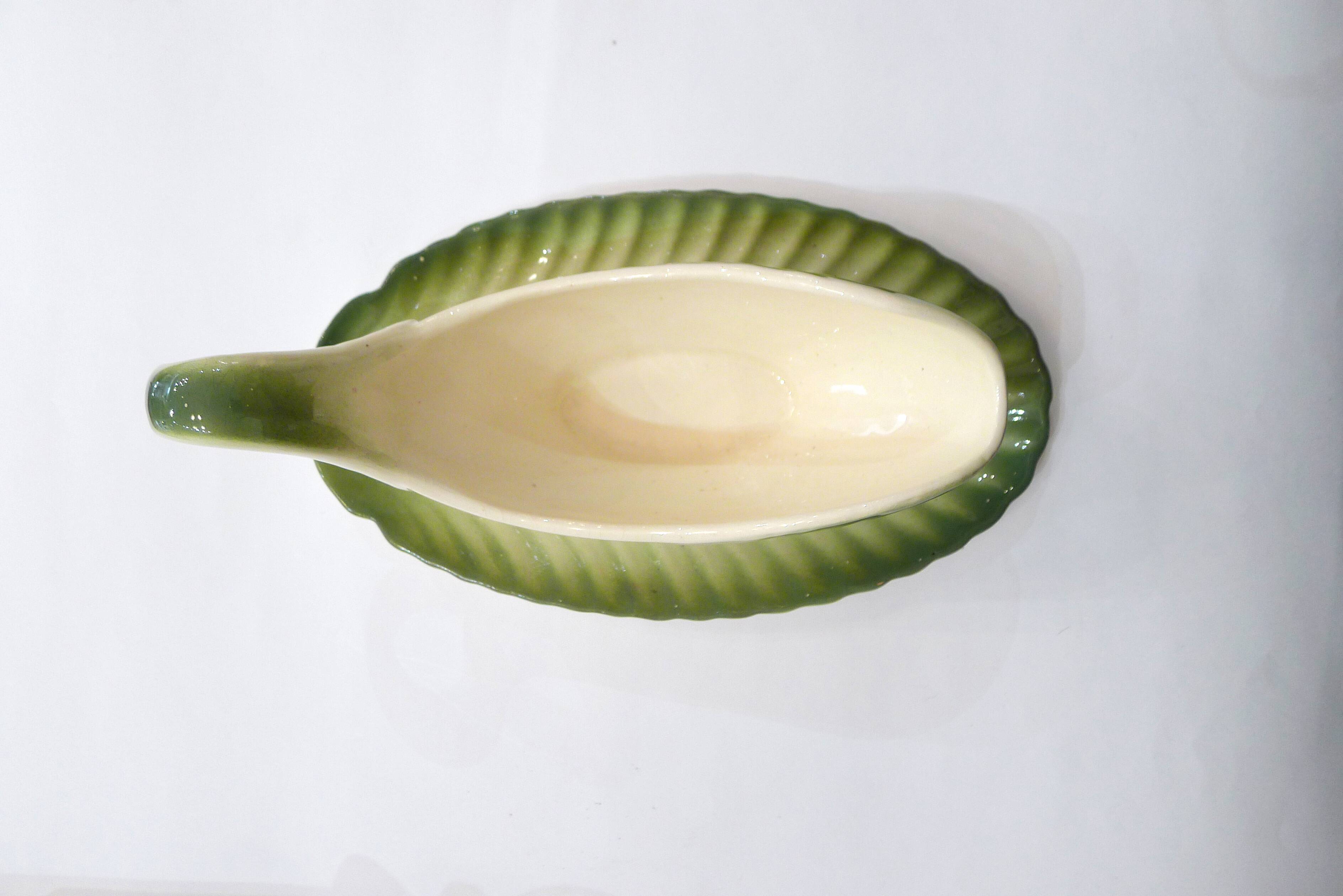 Fish dabbling sauce dish by Longwy