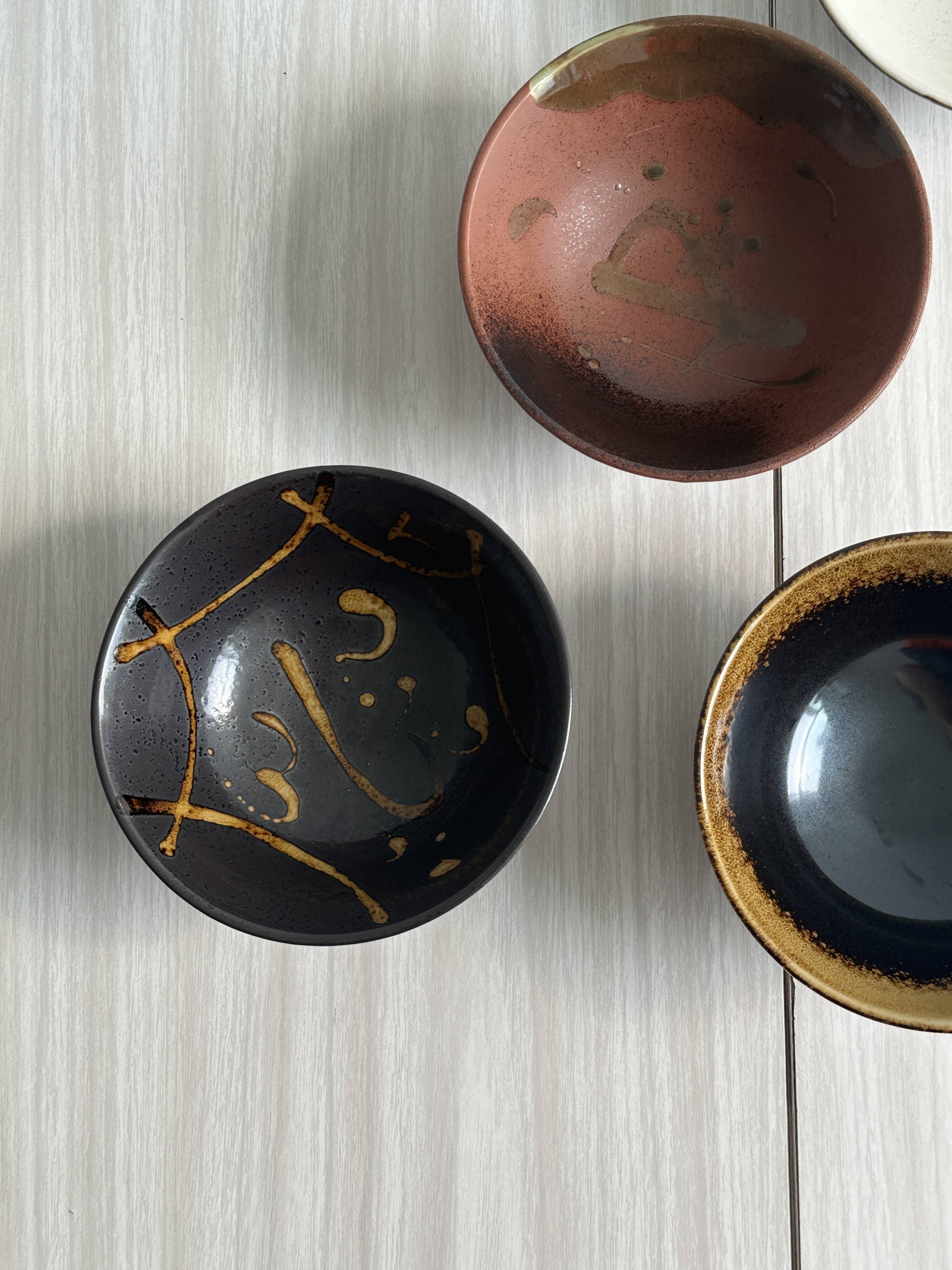 4 designer ceramic bowls