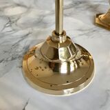 Set of three candlesticks in brass