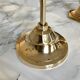 Set of three candlesticks in brass