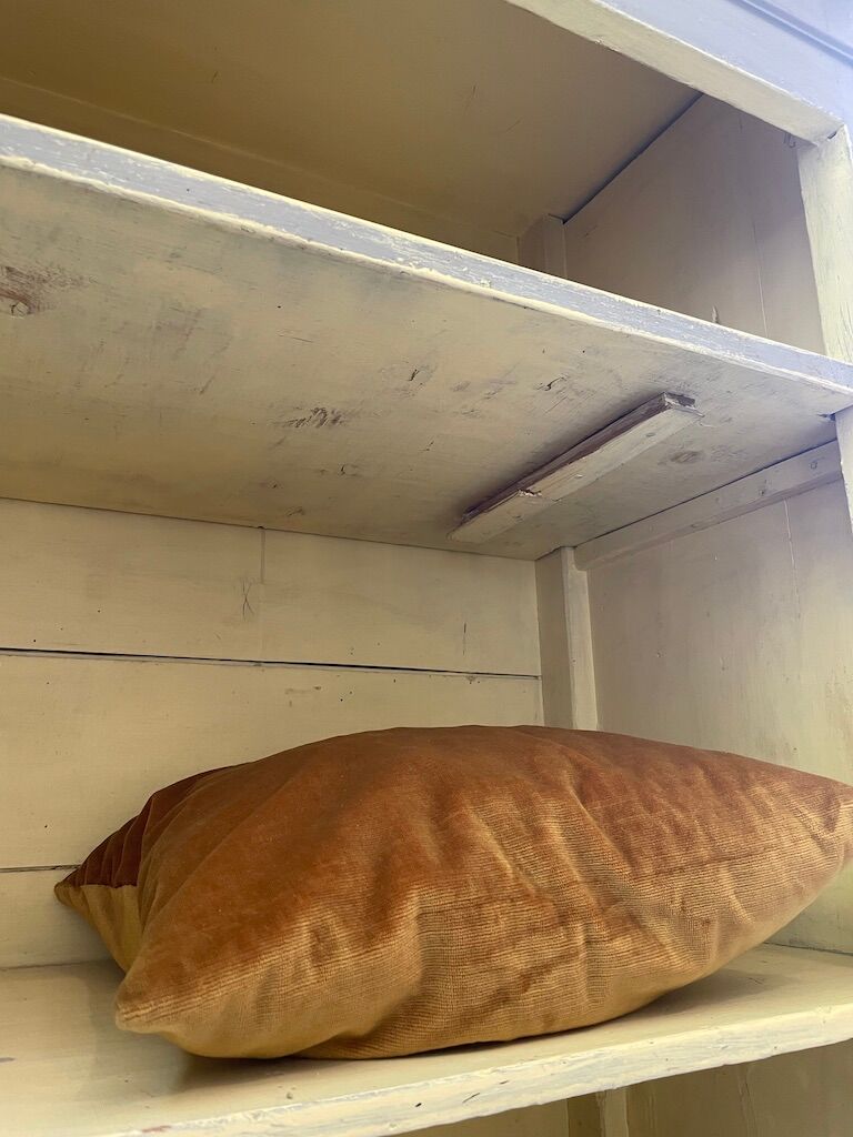 Blue patinated cap cabinet