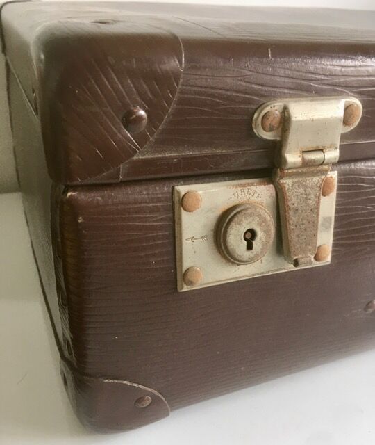 Old brown suitcase