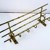 Bamboo-like coat rack in bronze