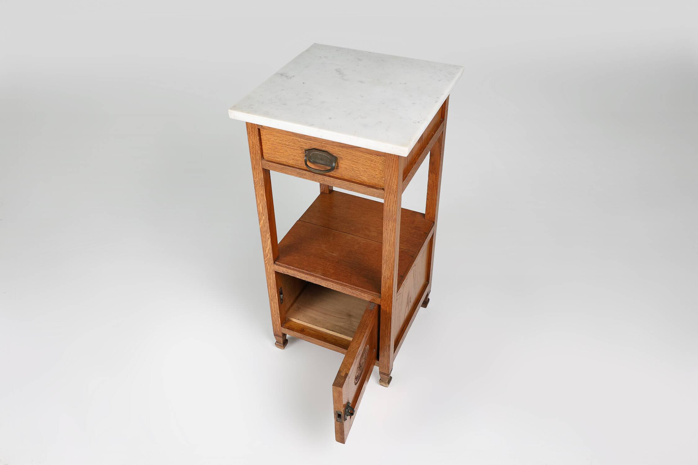 French Art Deco bedside table with a Carrara marble top, circa 1920.