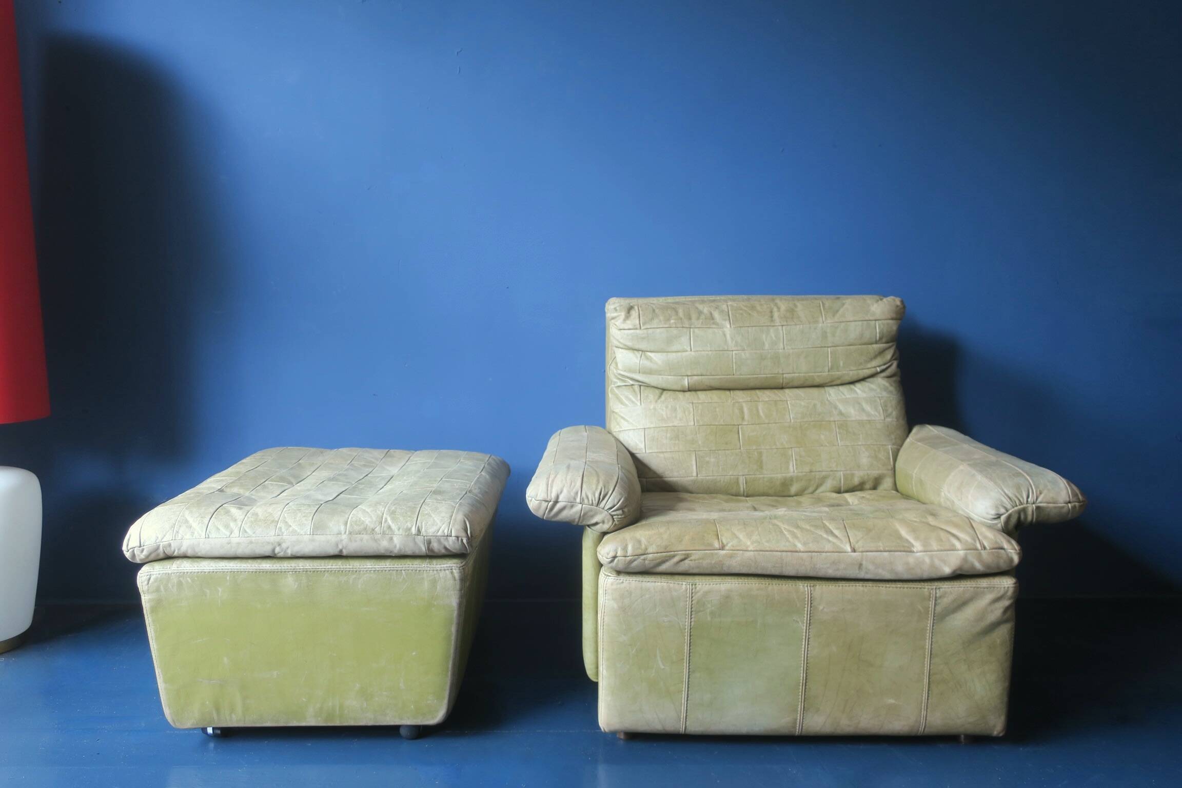 Patchwork leather olive green lounge chair and ottoman by Laauser, 1970s