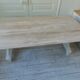 Console table in walnut with drop-leaf extensions, grey patinated base.