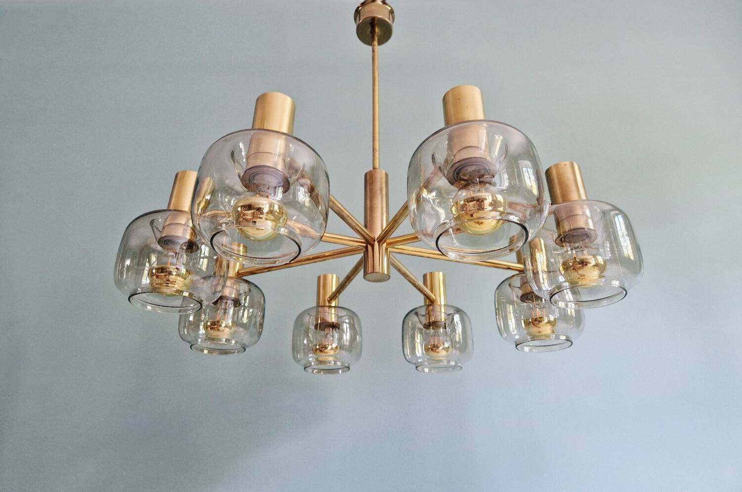 Large designer chandelier in brass and smoked glass globes, 1970s