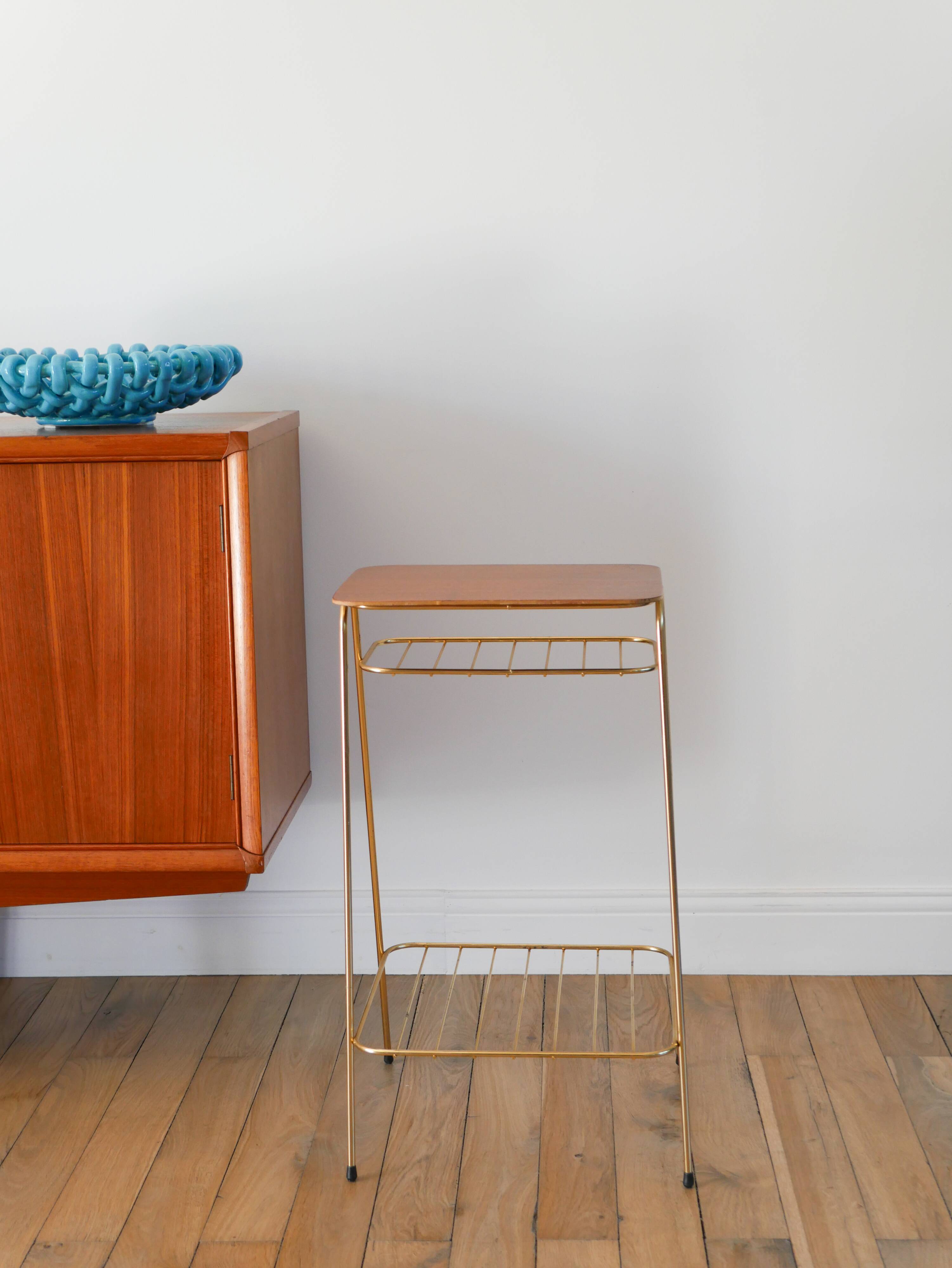 Small brass side table with a teak top, 1960.