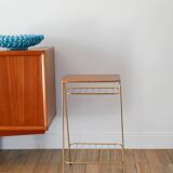 Small brass side table with a teak top, 1960.
