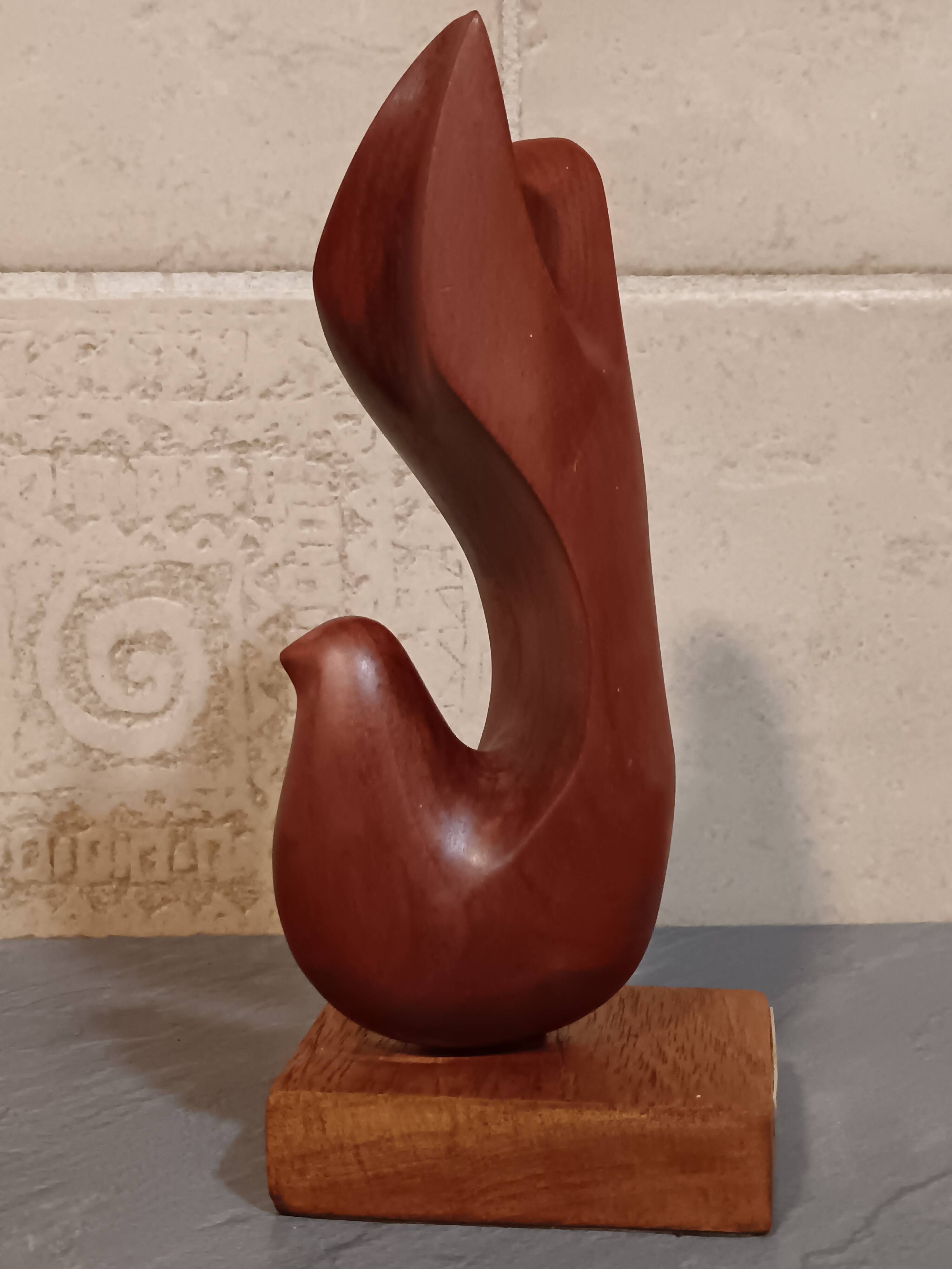 Scandinavian dove in carved teak wood, signed NM, circa 1960.