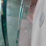 Suite of 3 nesting tables in curved glass from the 80s.