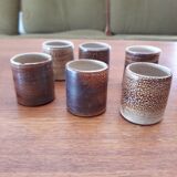 Signed stoneware liqueur service