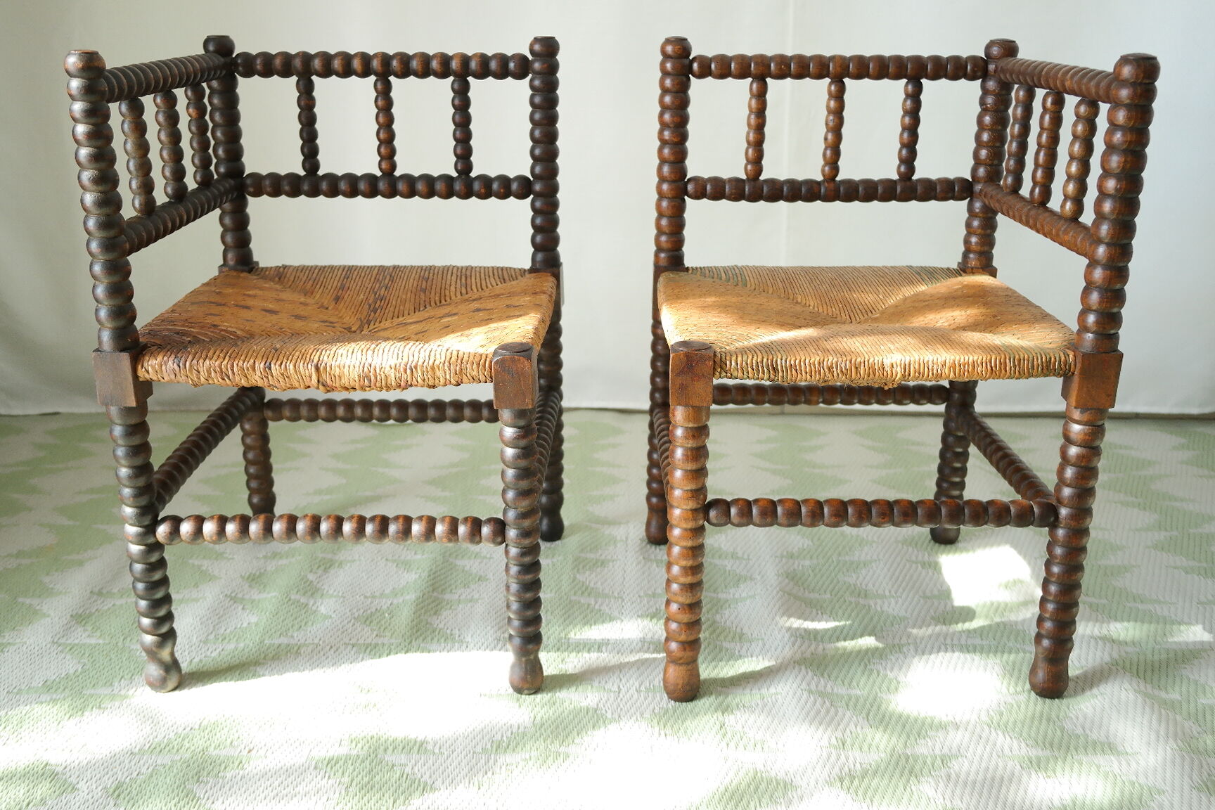 Pair of chairs corner fireplace turned beaded wood