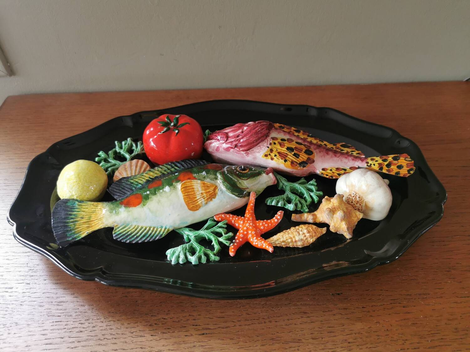 Vintage barbotine dish with fish decoration in relief