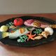 Vintage barbotine dish with fish decoration in relief