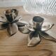 Duo of brass star candle holders