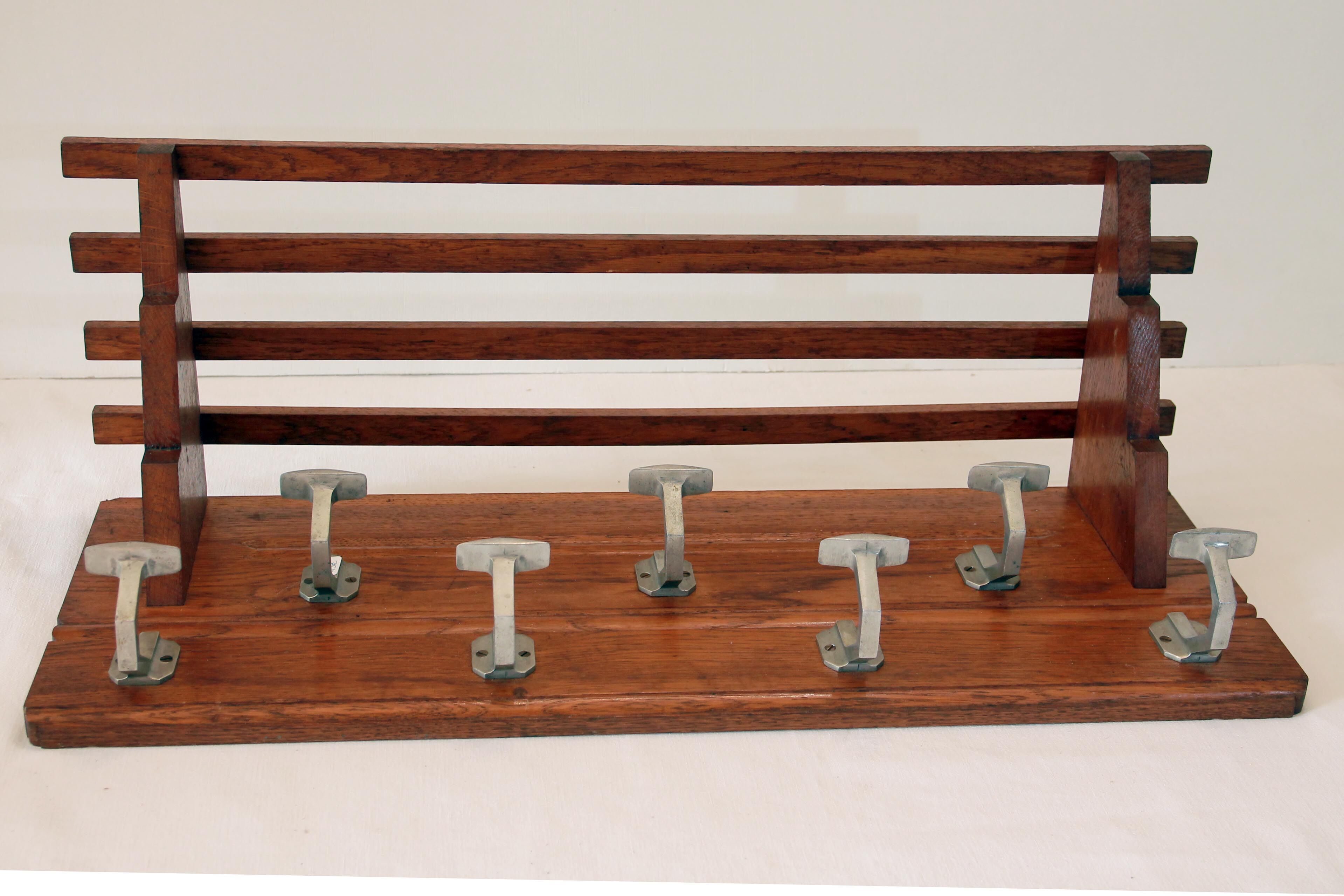 Baggage door and wooden coat rack