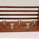 Baggage door and wooden coat rack