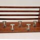 Baggage door and wooden coat rack