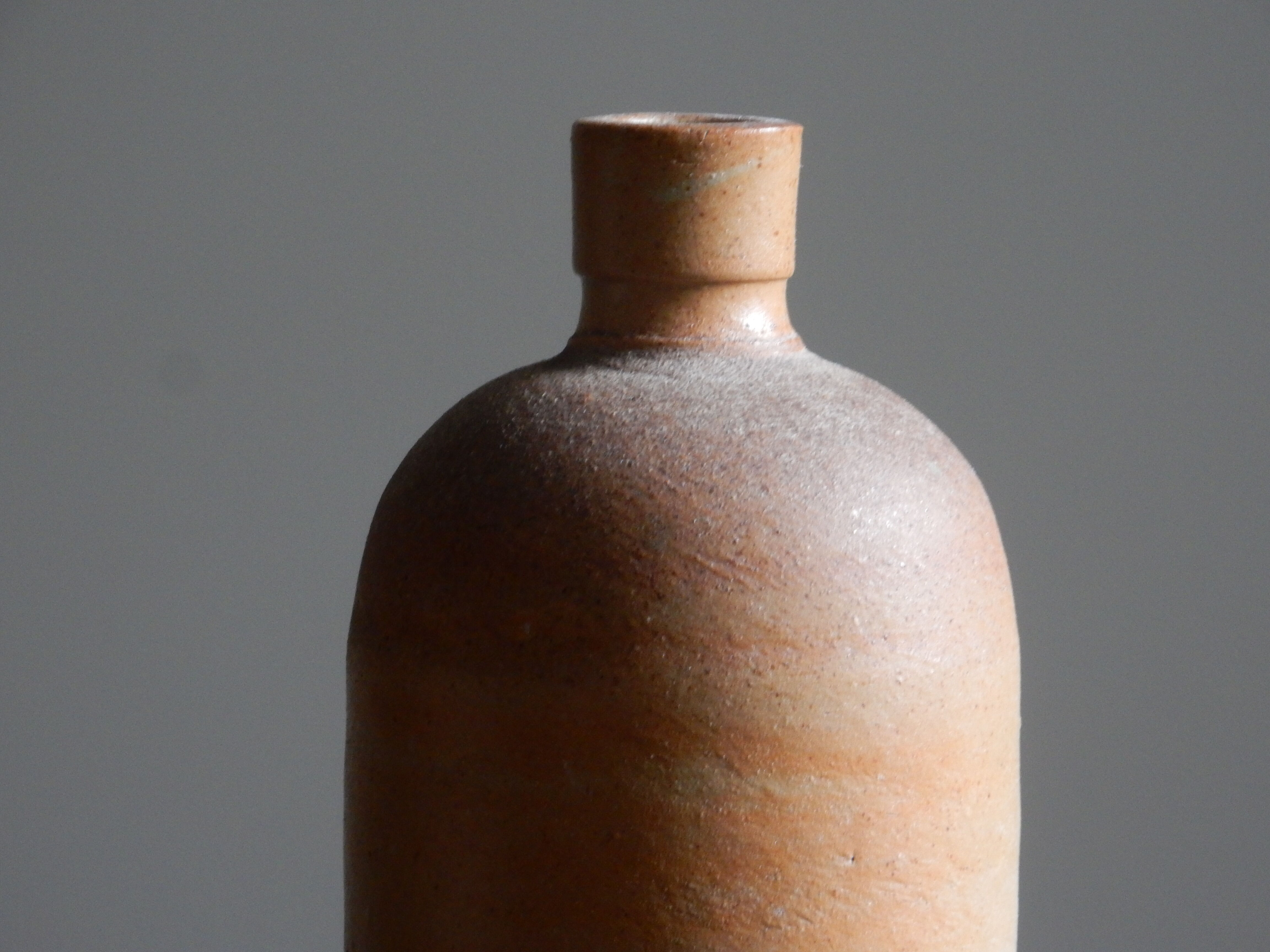 Old matte sandstone bottle