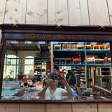 Louis XVI style mirror in mahogany and gold.