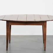 Rare antique oval French extendable dining table made of fruitwood