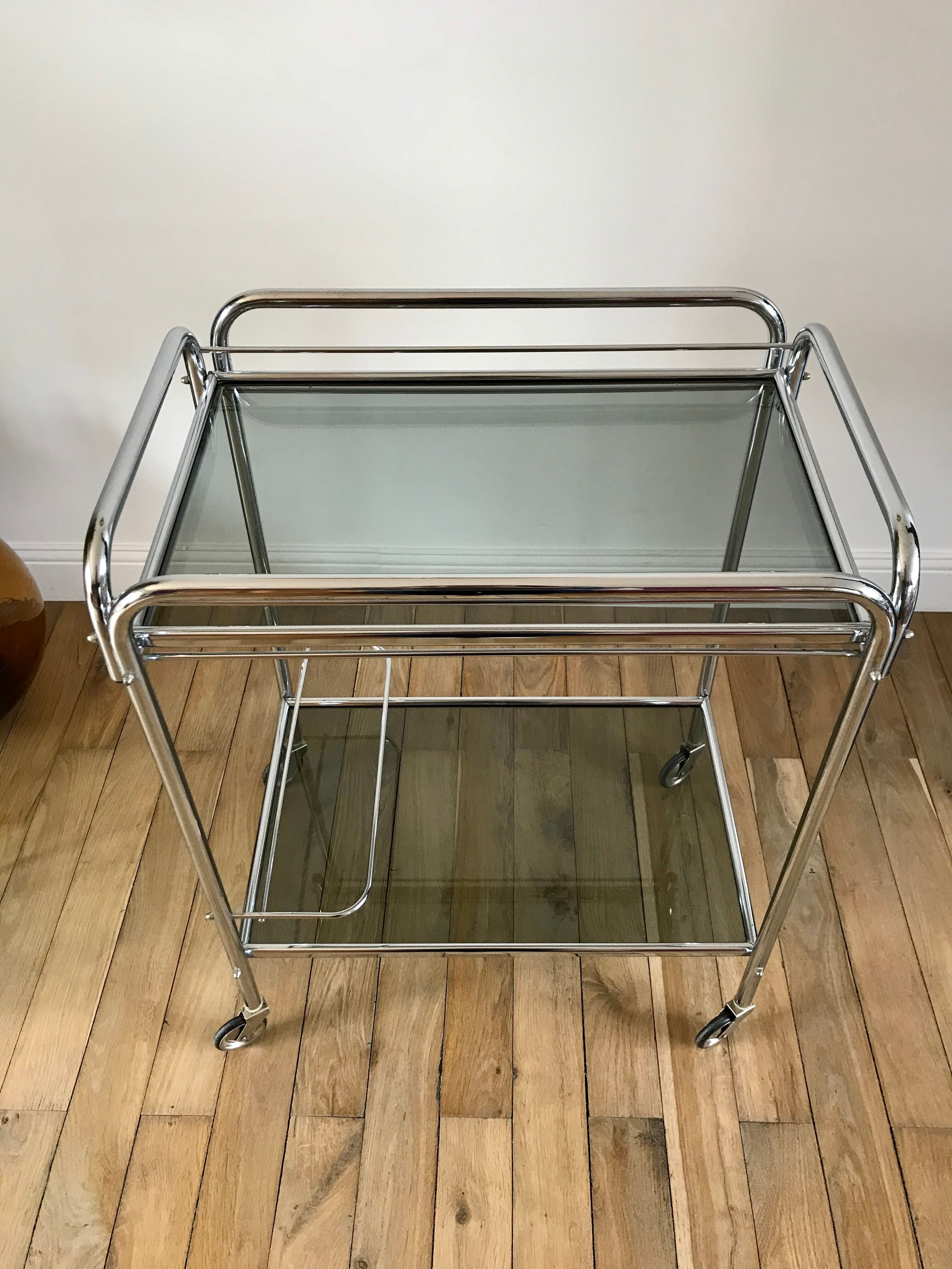 Serving in chrome steel and smoked glass 70s