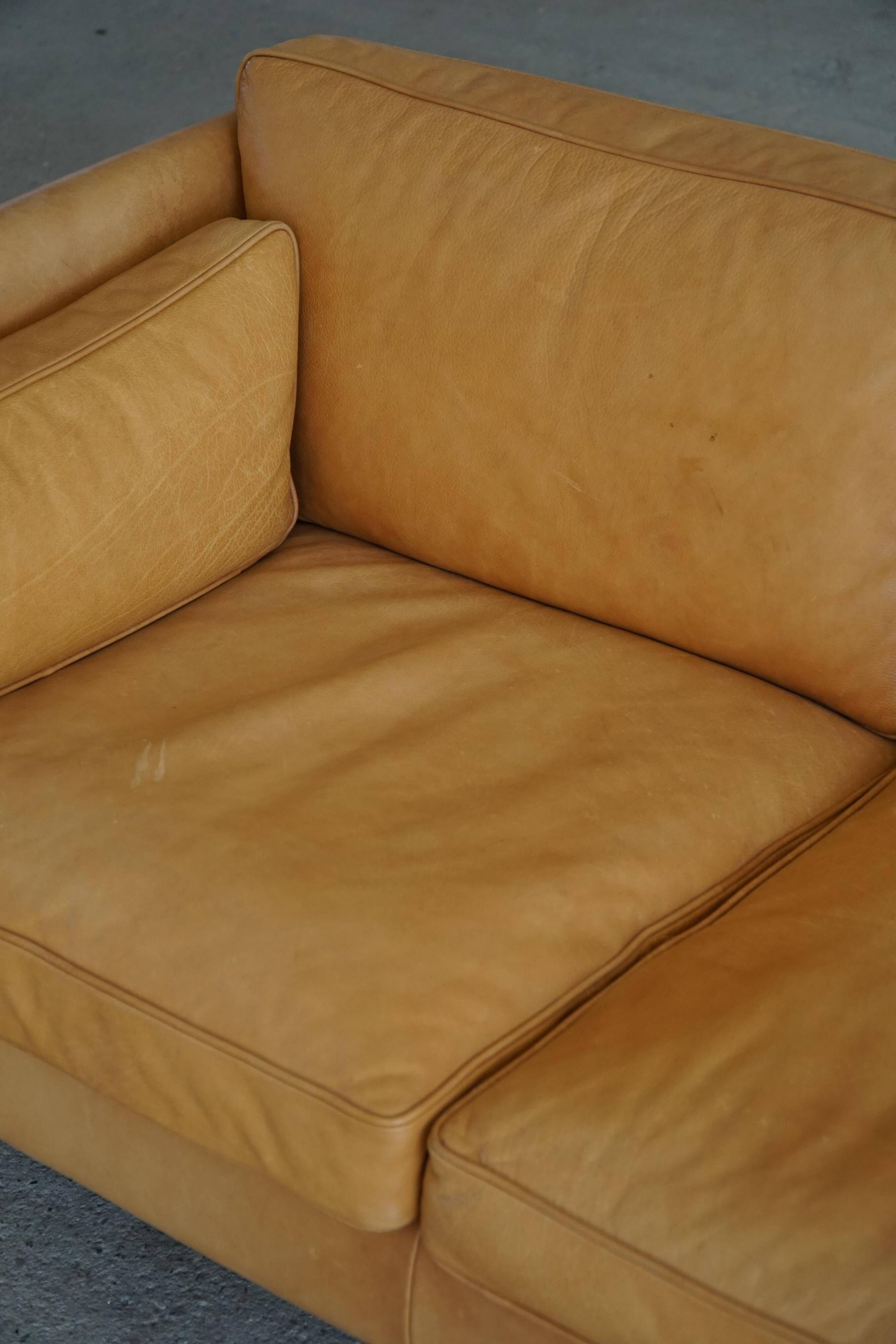 Danish Midcentury 3-seater canapé by Stouby in cognac brown leather, made in the 1970s.