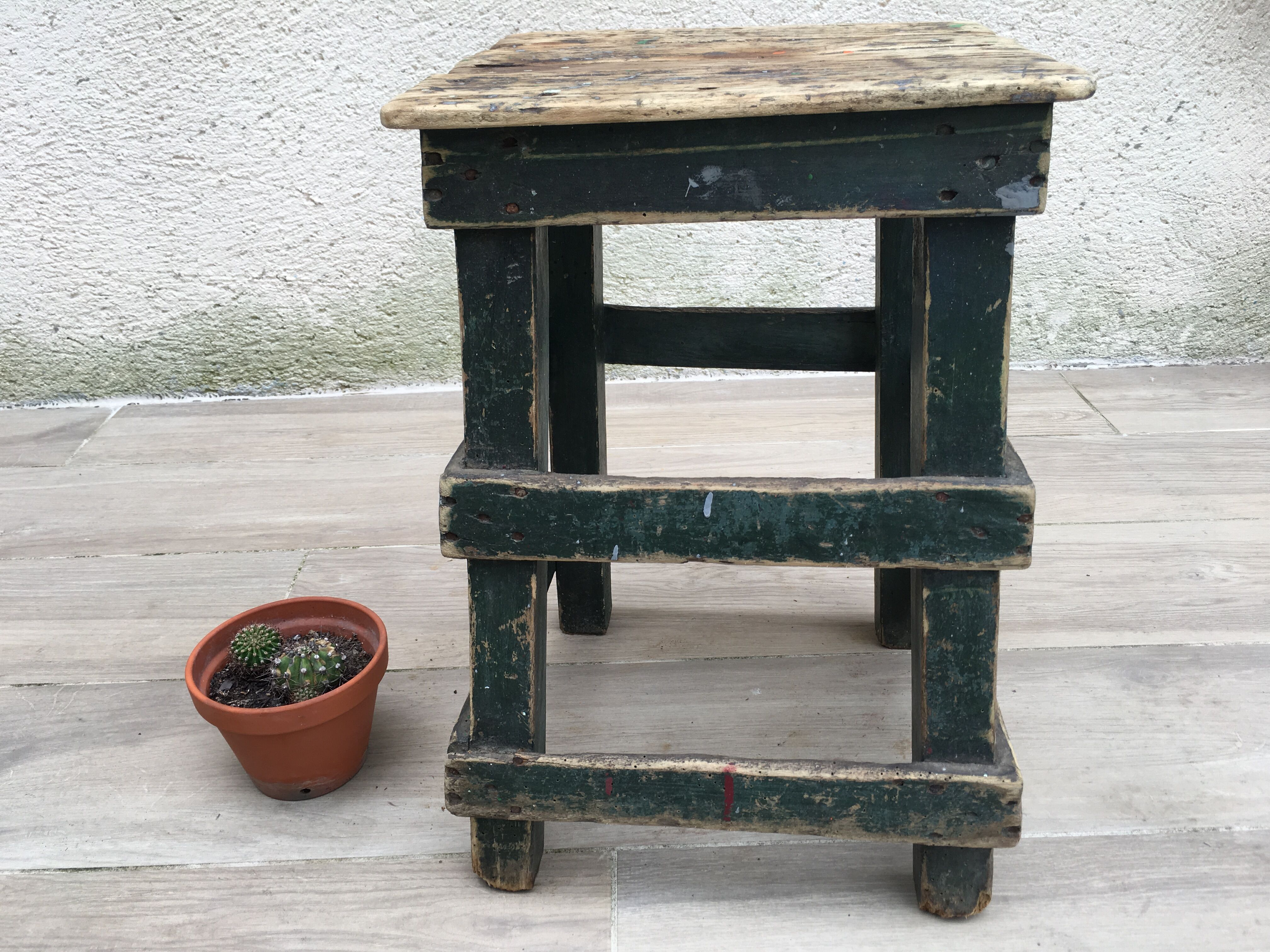 Former green workshop stool