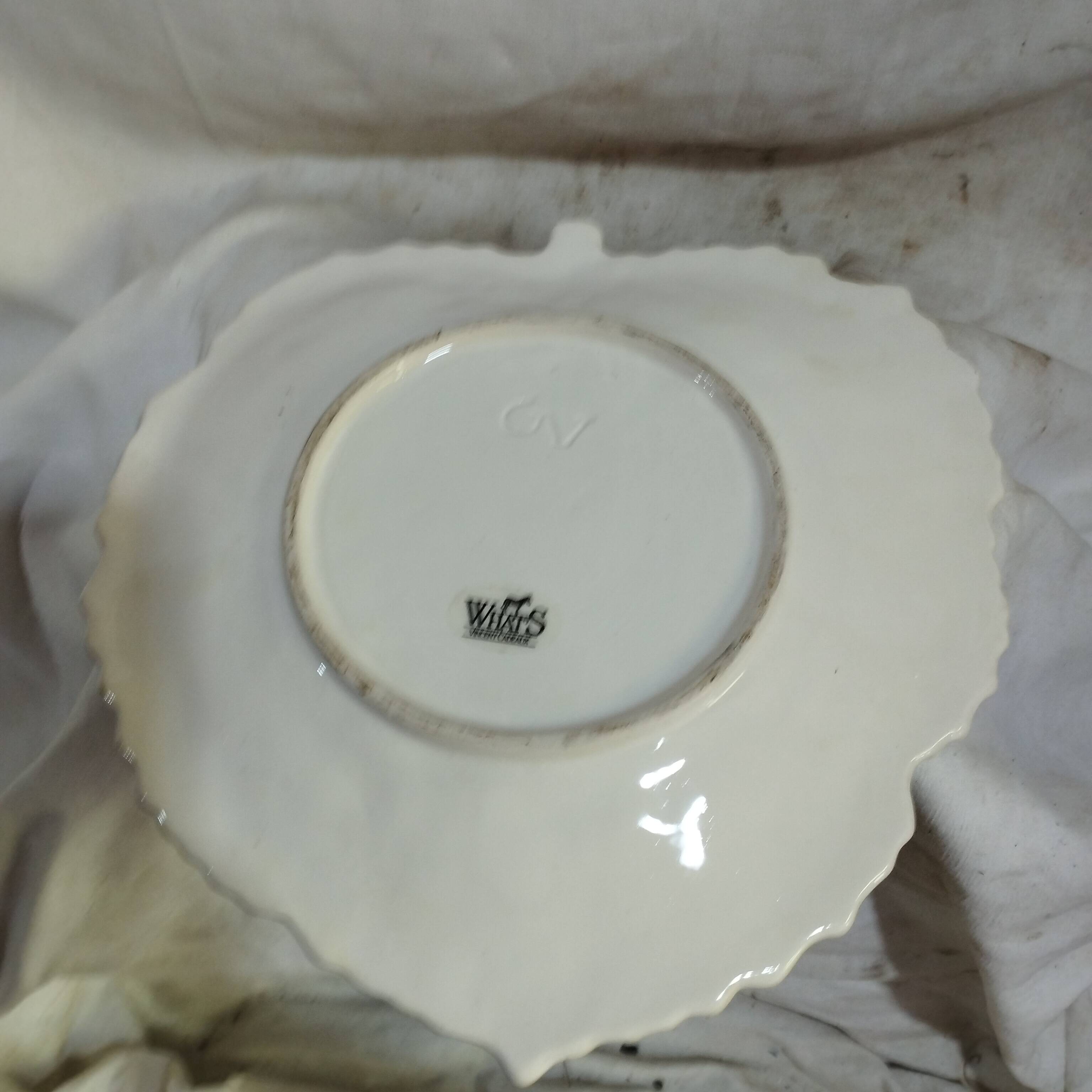 old strawberry drainer in slipware