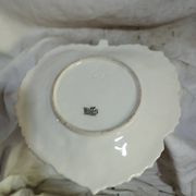 old strawberry drainer in slipware