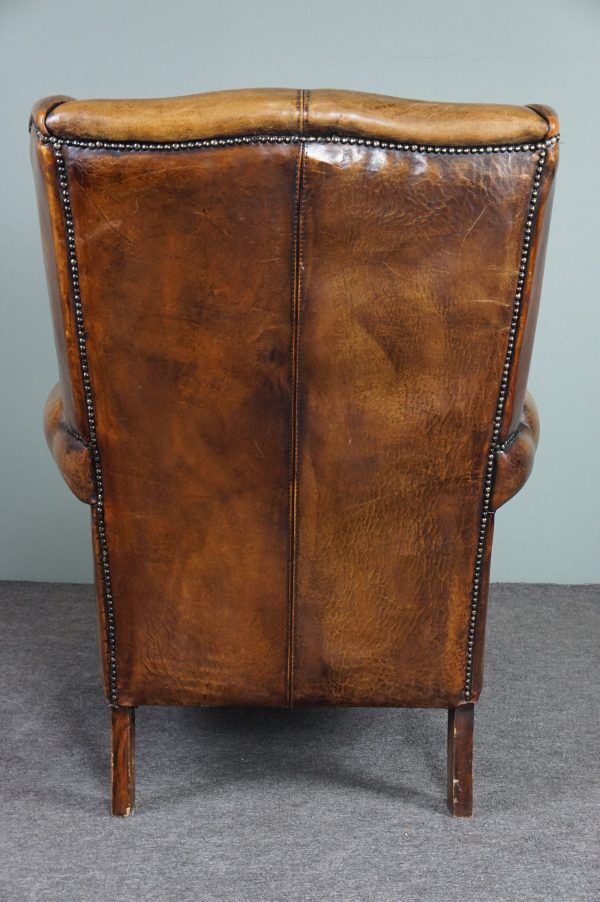 Armchair + sheepskin pouf