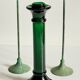 Green glass and metal candle holders