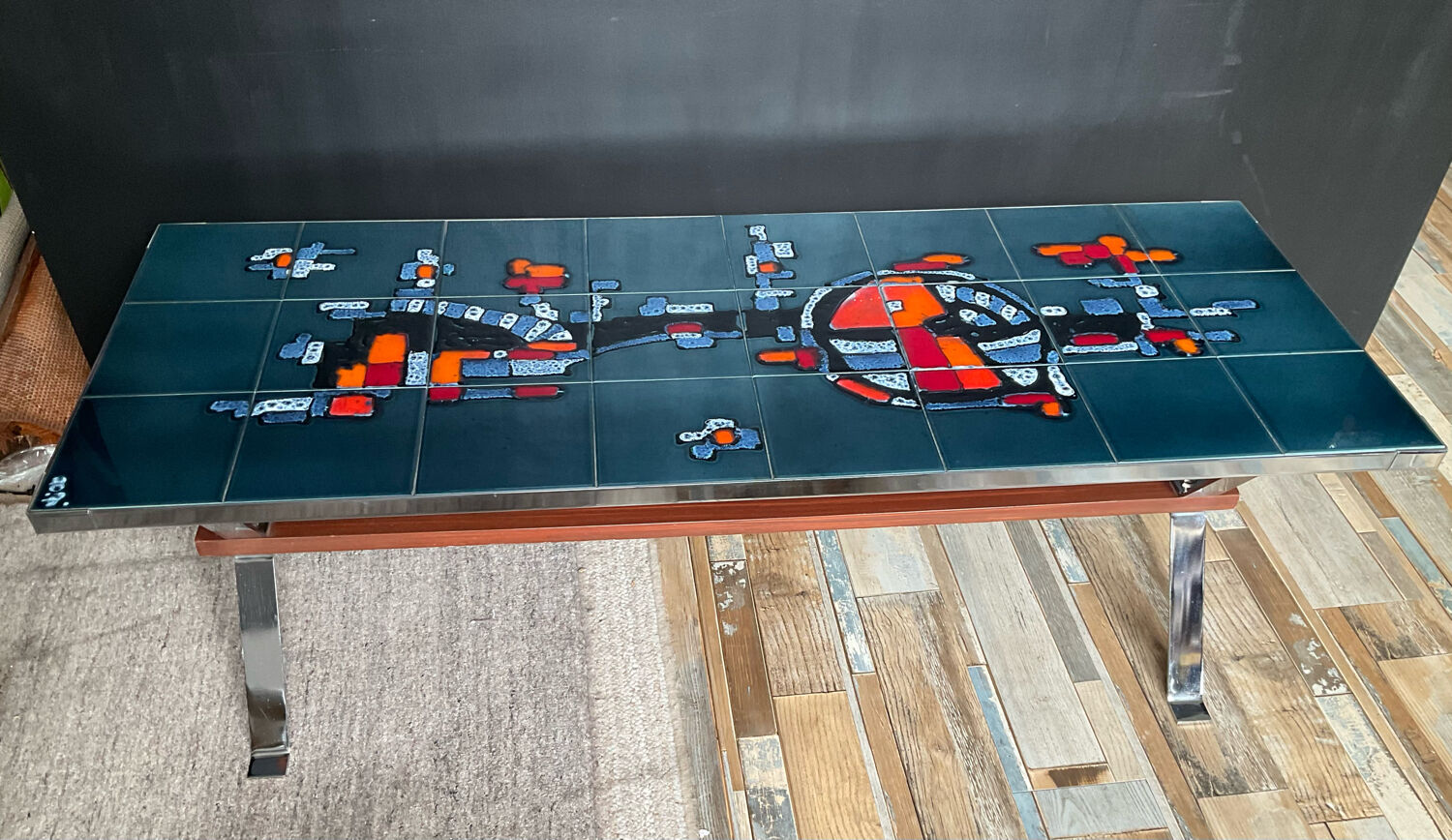 Coffee table in signed ceramic and chromed metal 70s