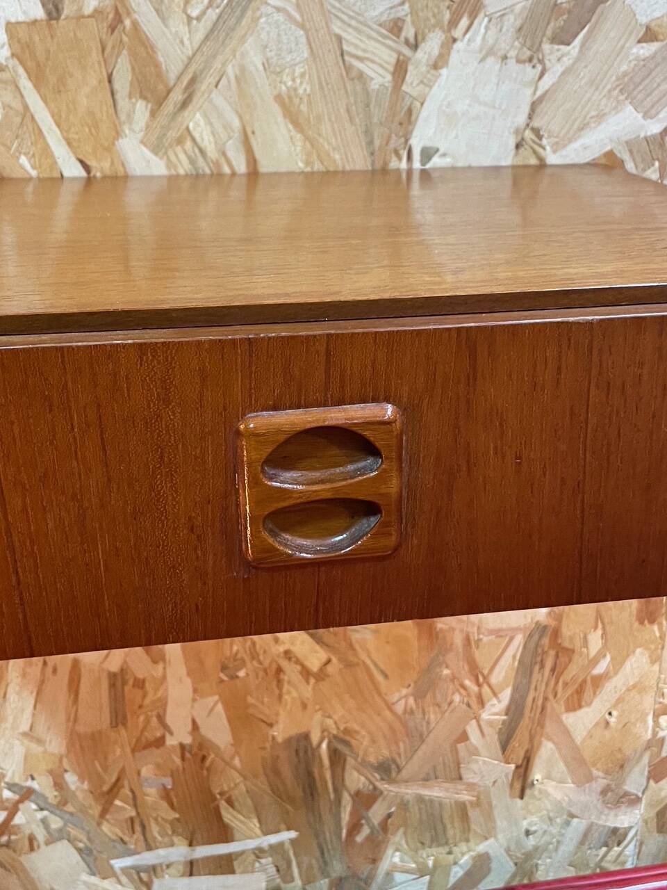 Suspended teak bedside tables in vintage 1960s Scandinavian style.