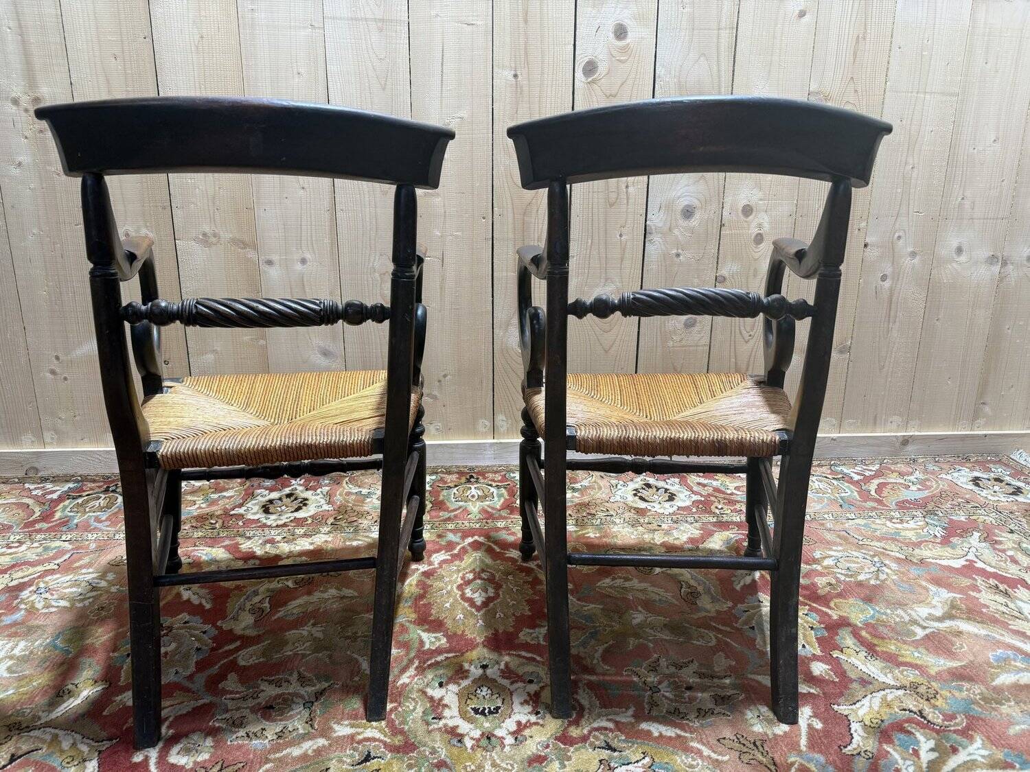 Pair of rustic straw-seated armchairs