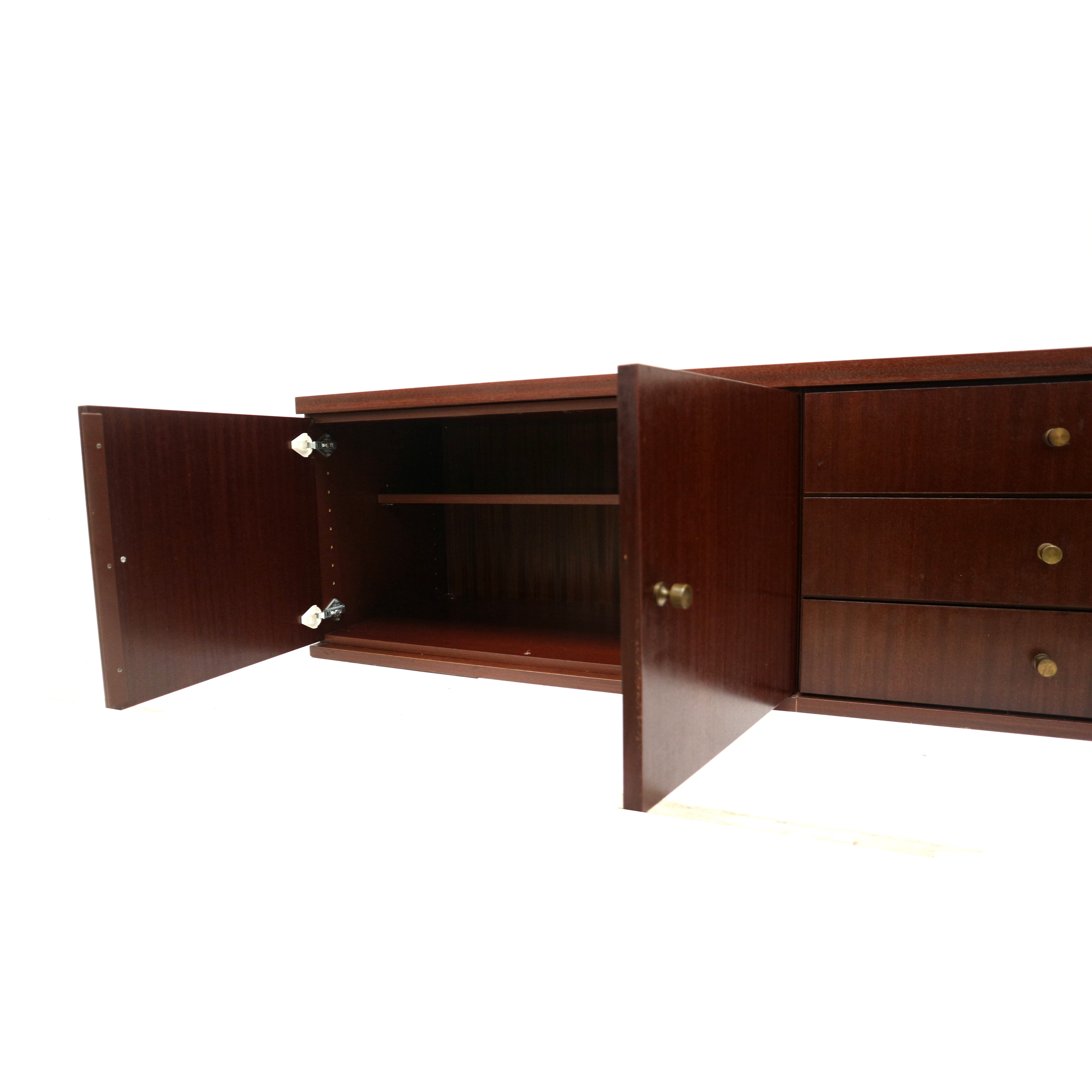 Hanging vintage low sideboard from the 1970s