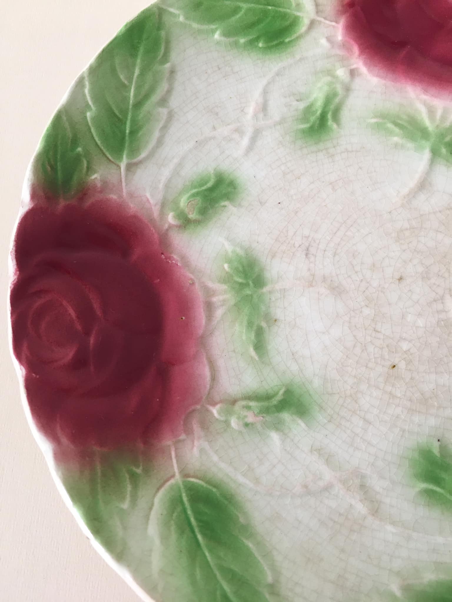 Old slip plate decorated with Majolica roses
