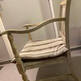 A pair of low armchairs