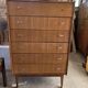 Mid-Century chest of drawers in brown teak with 6 drawers, tall model from the 1960s.