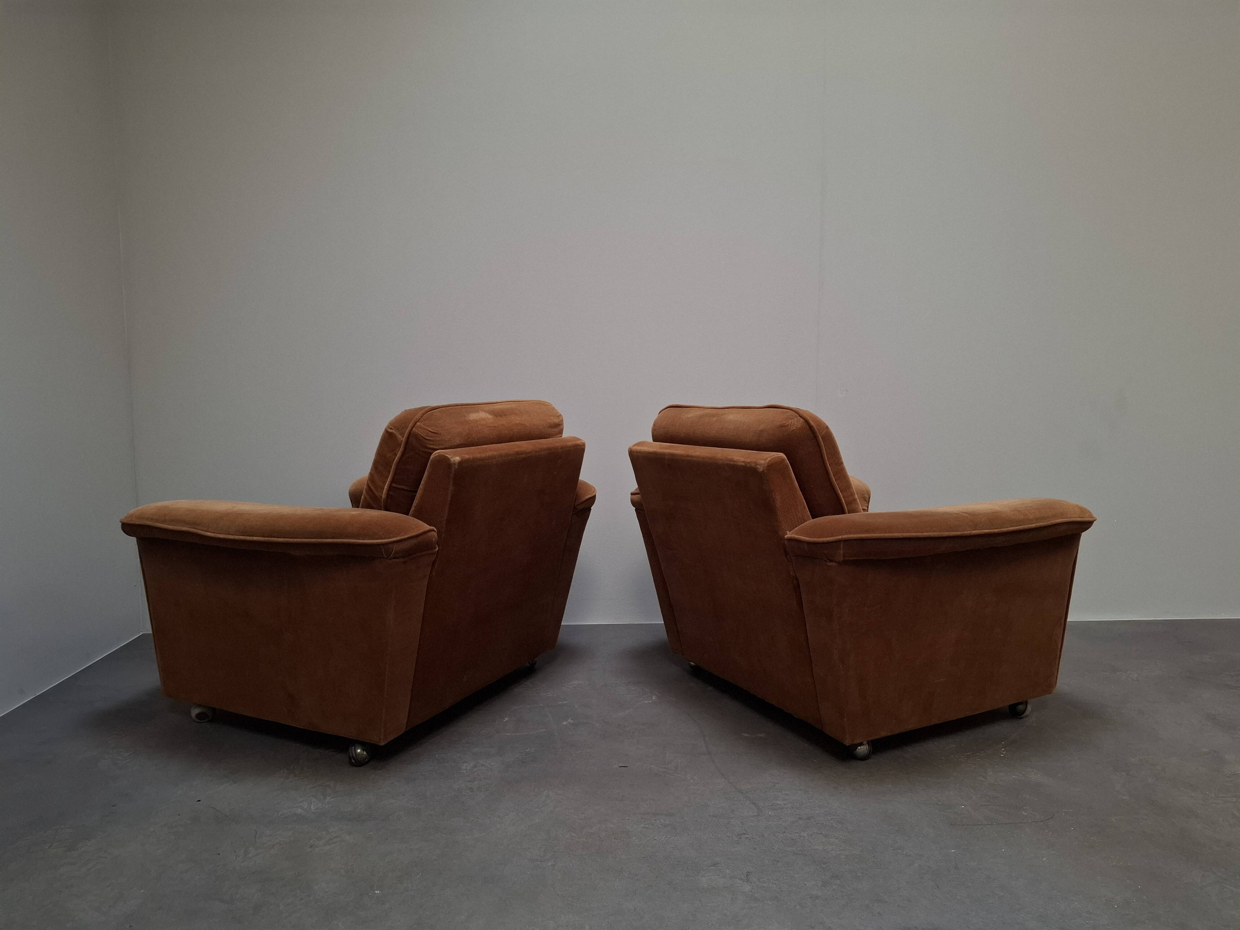 Pair of Mid-Century Modern Czech Lounge Armchairs with Rolling Casters