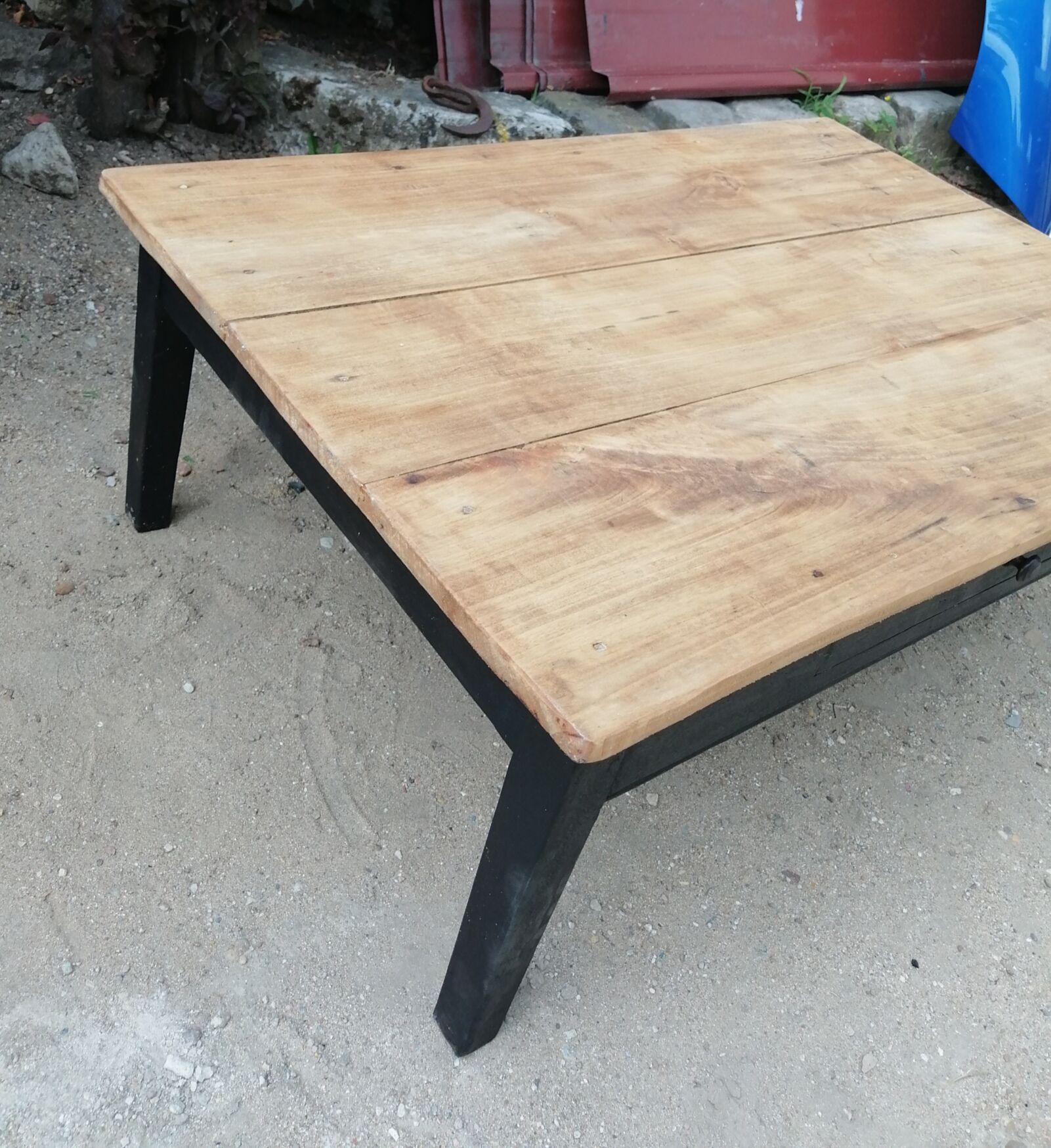 Wooden coffee table with a drawer