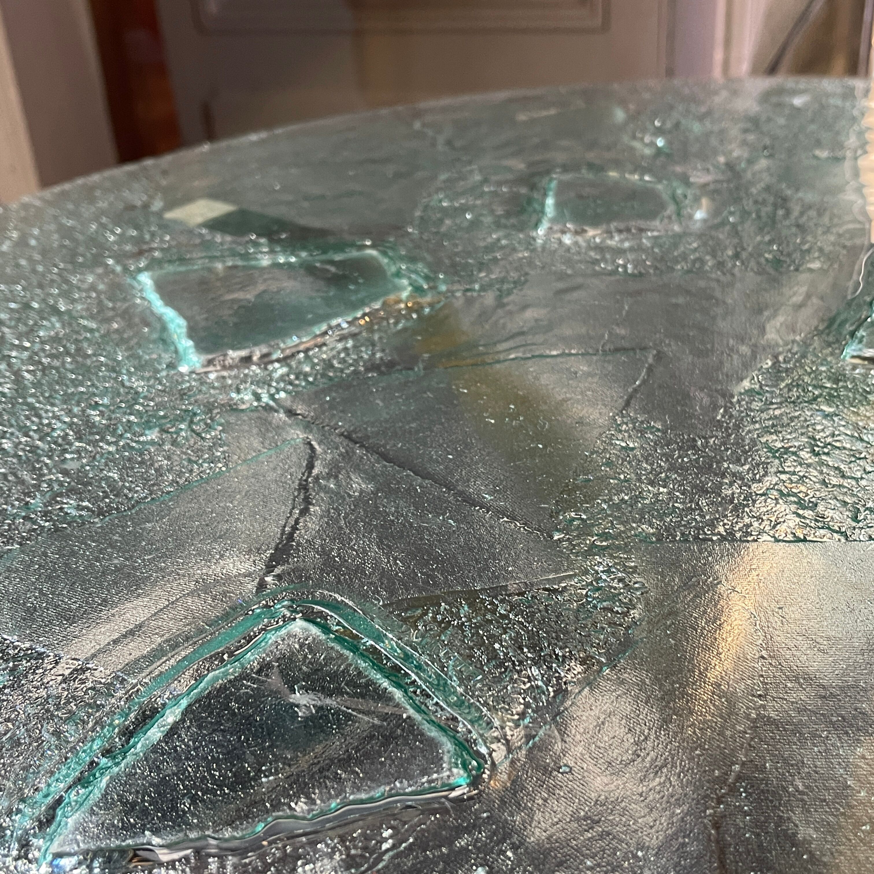 Pair of round coffee tables, glass, ca 1970