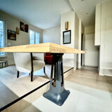 Solid oak dining table and cast iron.